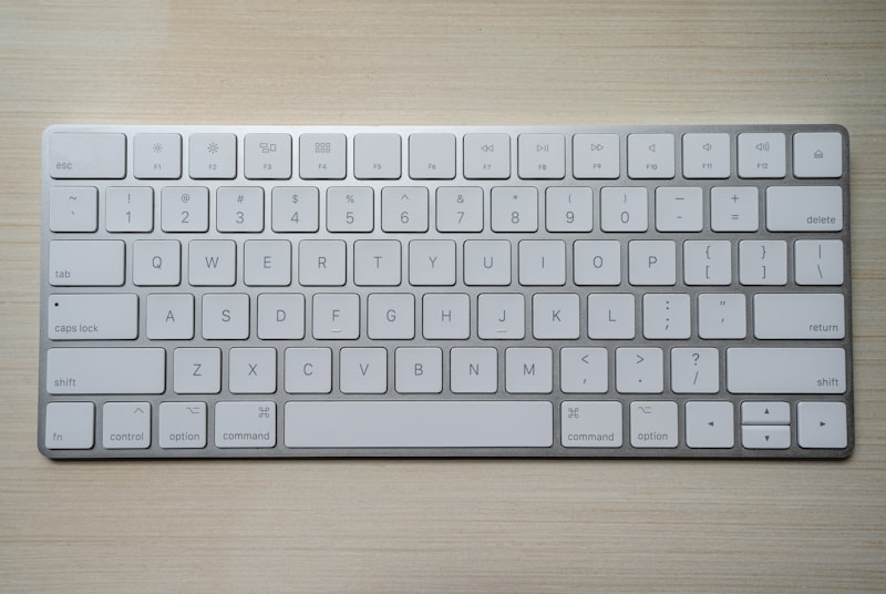 Person typing on keyboard